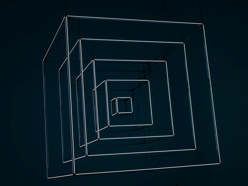 Symmetric neon patterns suggesting balance and structure